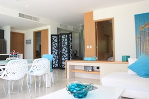 Social area, TV room and secondary bedroom.