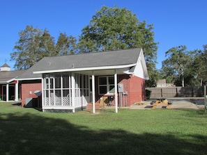 Back & Side of Cottage on private lane with plenty of parking even for trailers for Crusin on the Coast.