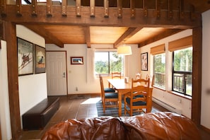 Dining room with views across Alder Creek