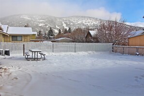 Large fenced back yard with view of Gold Mountain, BBQ Grill & Picnic Table