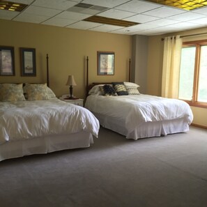 2 Queen beds on lower level with country view  & full bath off hallway 