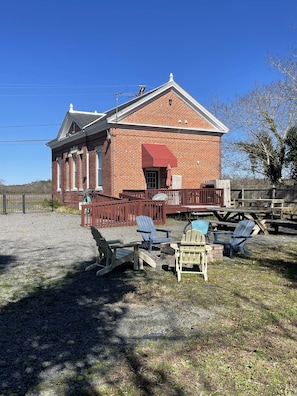 Rear of building, deck area, ramp and firepit