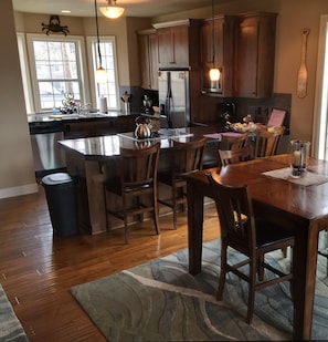 Dining and kitchen areas, with seating for up to 8.