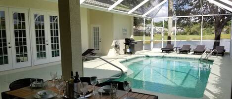 Pool area with dinning table