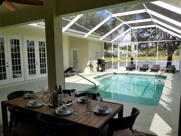 Pool area with dinning table