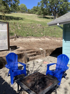 Fire Pit.  View deer that visit daily.  Wire  fence in back doesn't photograph