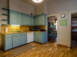 Kitchen with view into dining room. 