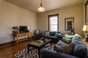 Family room with flatscreen smart TV.