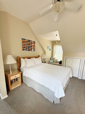 Queen suite with bay window and spacious setting. 