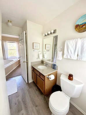 Beautiful private bathroom with walk in tile shower. 