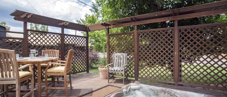 Hot tub and outdoor dining area