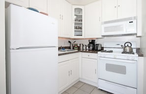 Beautiful Kitchen with Deep Sink and Granite Counters.