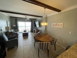 Dining area with table for 4 and 2 barstools
