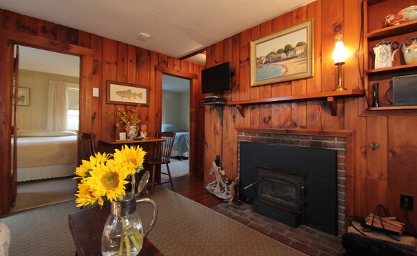 Spruce cottage living room with view of bedrooms