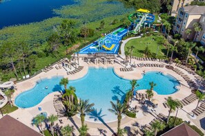 Drone shot of community pool and water park.