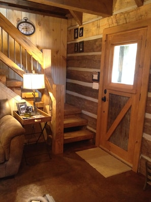 Custom made door and staircase just inside main entrance