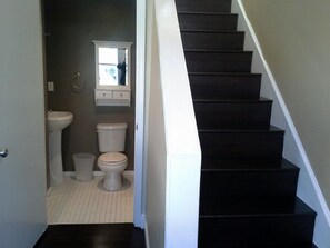 Downstairs Bathroom with standup shower, stairs to 2nd floor. All bedrooms upsta