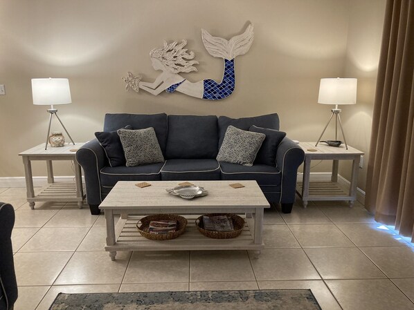 Living room with full beach view. Queen sleeper sofa.