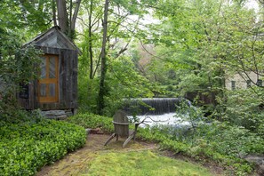 Waterfall view, shed has viewing window if it is raining.  2 chairs now