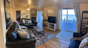 Living room area looks directly out to beautiful view