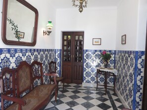 Hall with ancient tiles and marble floor