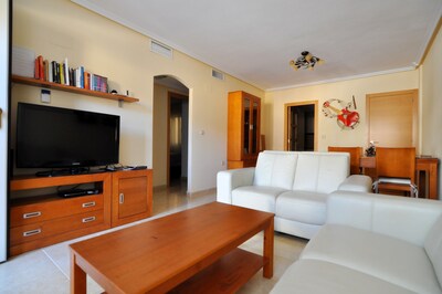 Luxury family-friendly apartment with rooftop pool in secluded Vega Baja region