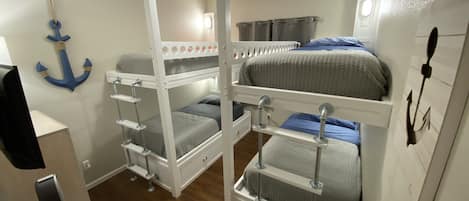 Built in twin bunkbeds.  Comfortable for adults! USB, outlet and light in each.