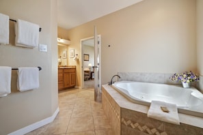 This beautiful Jacuzzi tub is located in the master bedroom