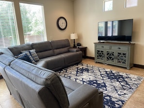 Family room has a 4K 55” smart TV with DVR and Blu-ray/DVD player, games too!