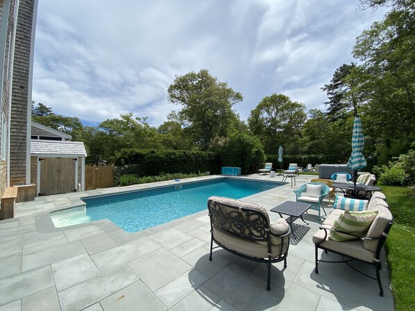 Private heated pool, large bluestone patio, Hot tub and  backyard area 