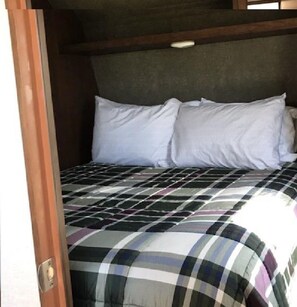 Separate bedroom with Queen bed.