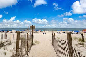 Walk directly onto the beach from the pool area.