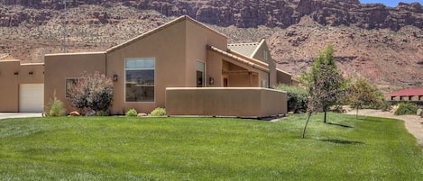 Welcome to Moab Magic Too 
3 bedroom/2 bath, 2 car garage and patio