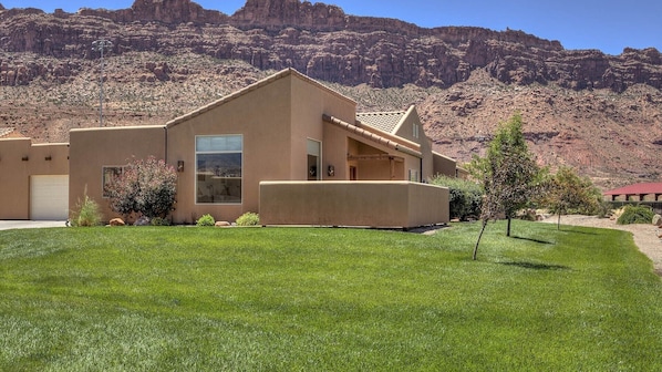 Welcome to Moab Magic Too 
3 bedroom/2 bath, 2 car garage and patio