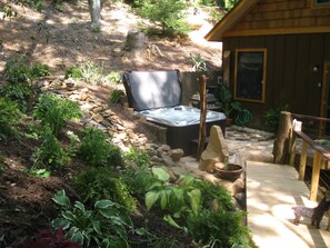 Relax in Hot Tub after Grilling Out on the Gas Grill