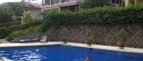 Steps from the Villa is the shared saltwater pool (24X48 meters) 3 to 6 feet. .