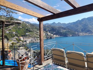 terrace overlooking the Pool and the sea