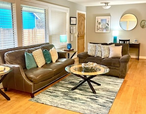 Sitting area in front of fireplace.