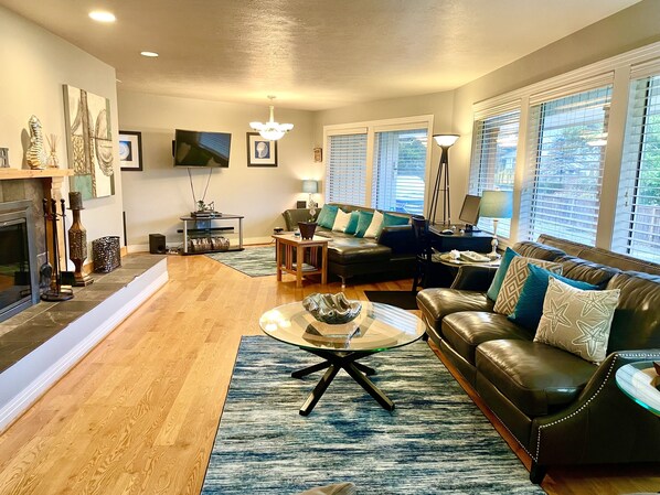 30 ft. living room has 3 couches and room for groups.