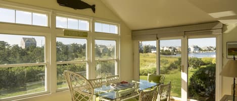 Spacious and bright dining area with water views