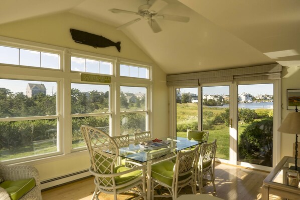 Spacious and bright dining area with water views