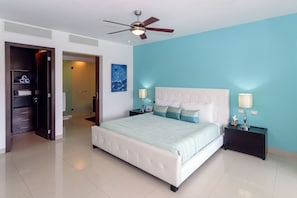 Master suite with king bed and TV