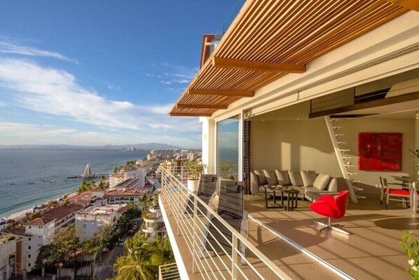 Lounge inside and out on a big open (and private) balcony with incredible views in all directions.