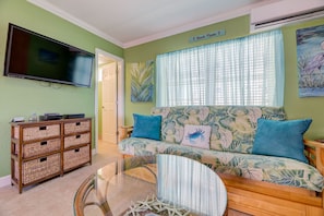 This futon couch opens to a full size bed all linens provided