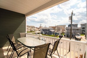Deck balcony with table and chairs off of 2nd floor Living Room