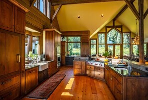 Kitchen view. Enjoy the fresh herb above the oversized farmhouse style sink