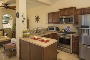 Your kitchen is well equipped with top appliances and cookware.