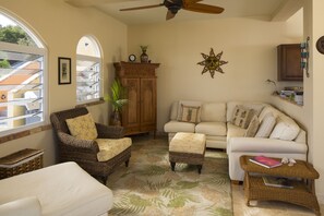 Living area - TV, movies, books and games inside the teak cabinet.