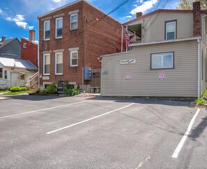 Two parking spaces right against the house