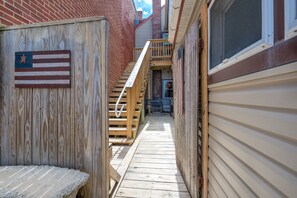 Enter the back gate to a nice patio